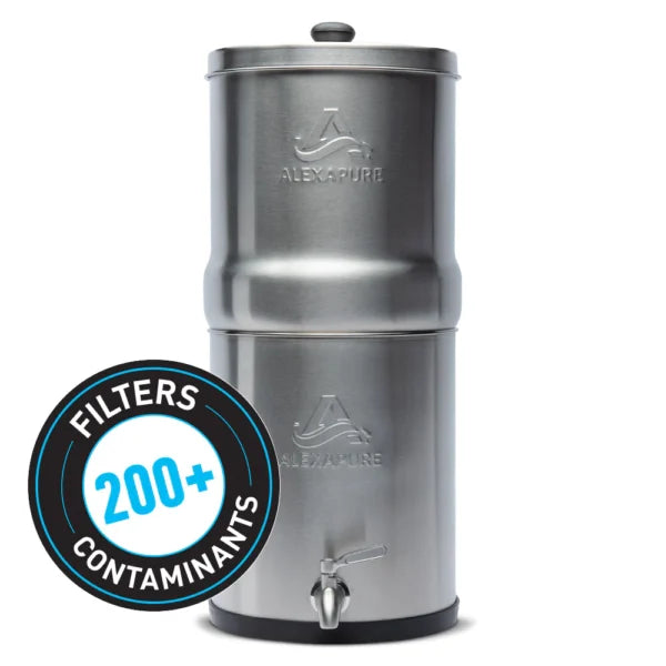 Stainless steel gravity water filter system with a spigot; badge in the foreground reads "Filters 200+ Contaminants.