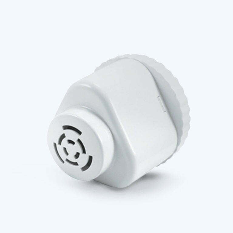 White cylindrical water filter cartridge with a vented cap, placed on a light gray background.