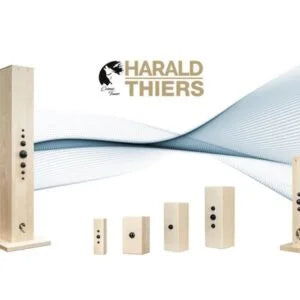 Six Cosmic Tower Bundles by Cosmic Tower, in various sizes, are displayed before a wavy blue graphic with the brand logo and "Harald Thiers" above—each bundle functions as an EMF neutralizer for energy harmonization.