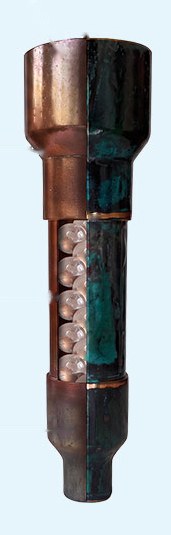 Cutaway of the Aqua Energizer showing the copper core, blue mineral patina and Brazilian quartz chamber