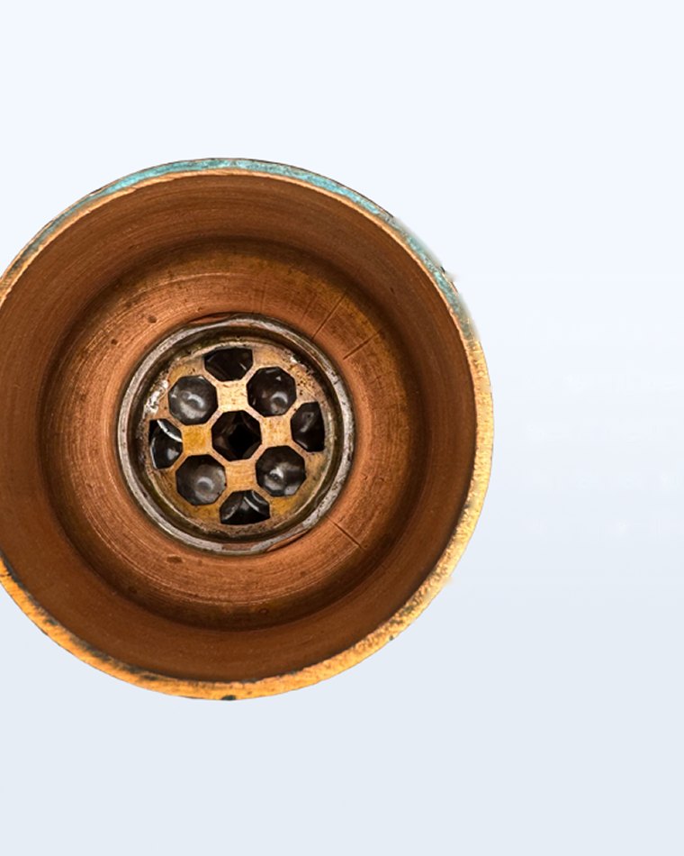 View into the copper funnel showing quartz crystals arranged in sacred geometry